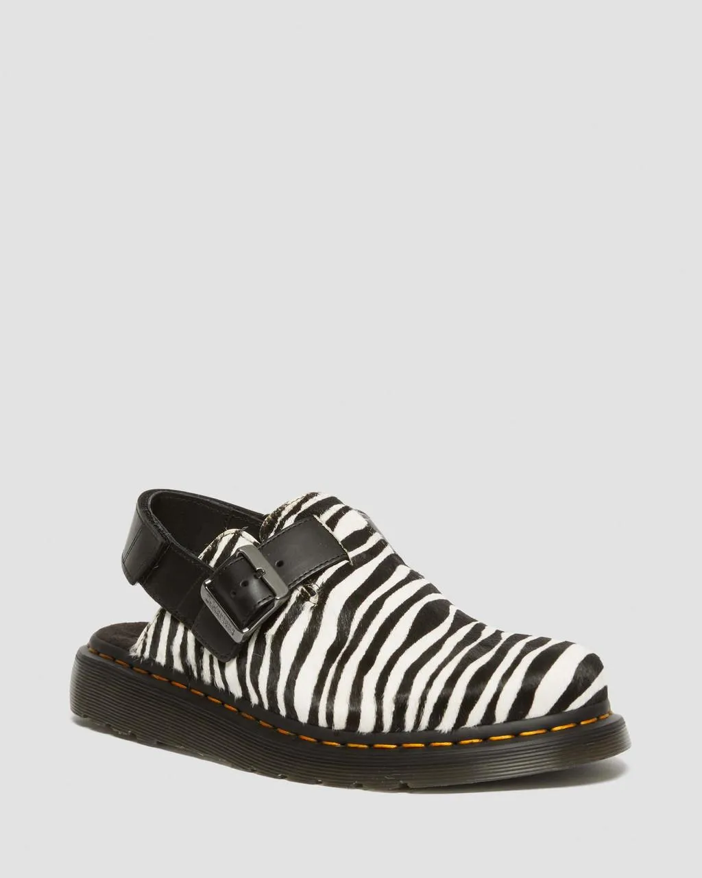 

Мюли Dr. Martens Jorge II с анималистичным принтом и пяткой на пятке, цвет Black+White — Hair On + Atlas