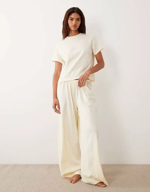 

Хлопковые пижамные брюки цвета пахты ASOS DESIGN mix & match