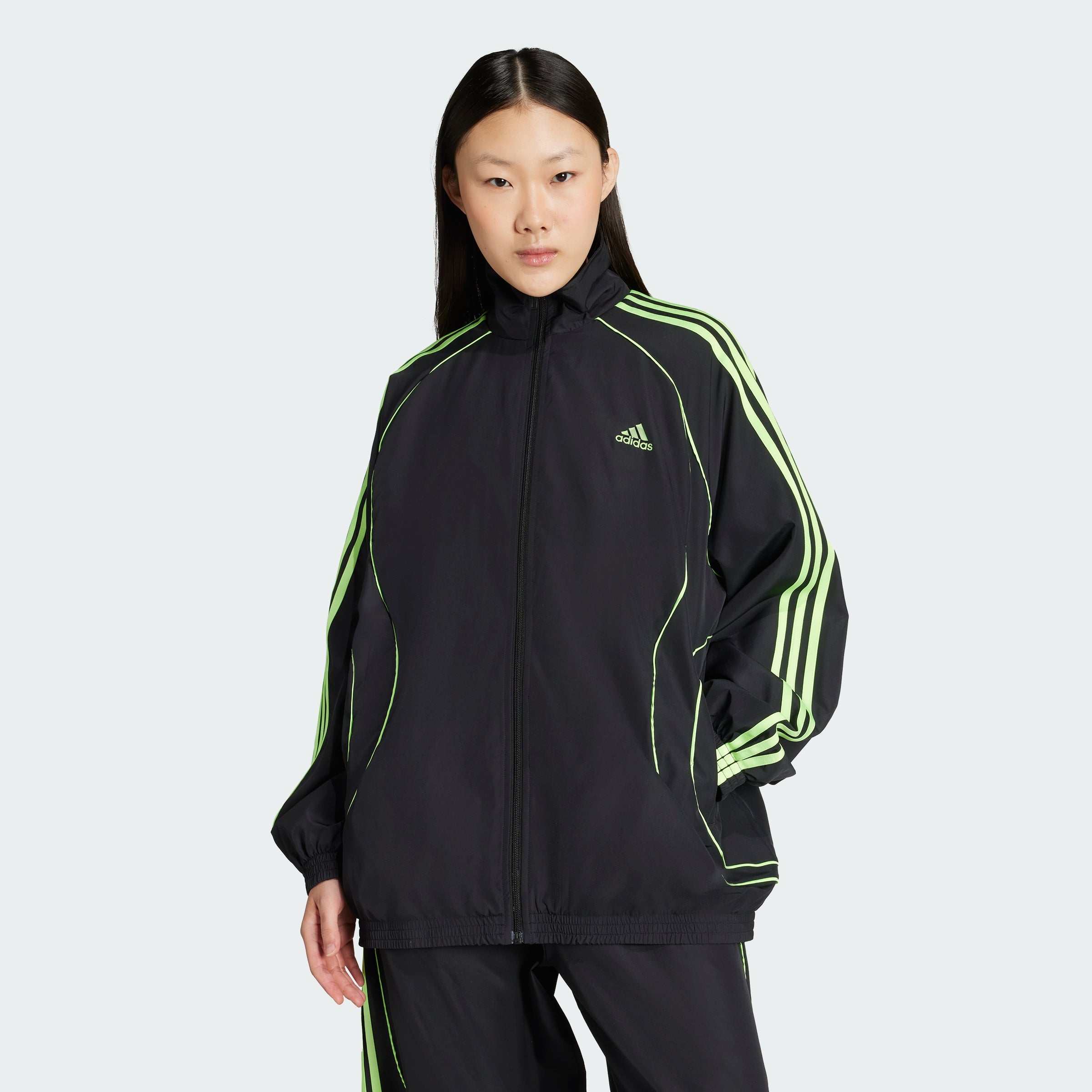 

Женская спортивная куртка Adidas Teamgeist Adicolor Oversized Woven Track Top, черный/зеленый