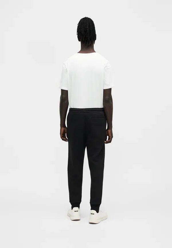 Штаны спортивные Union hadiko tracksuit bottoms Boss, черный — фото 3