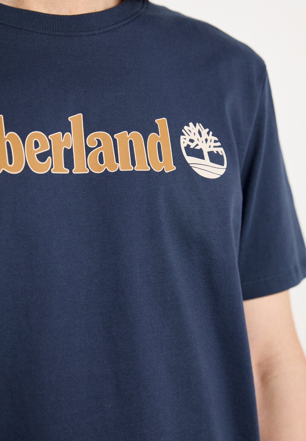 

Футболка с принтом KENNEBEC RIVER LINEAR LOGO SHORT SLEEVE Timberland, темно-синий