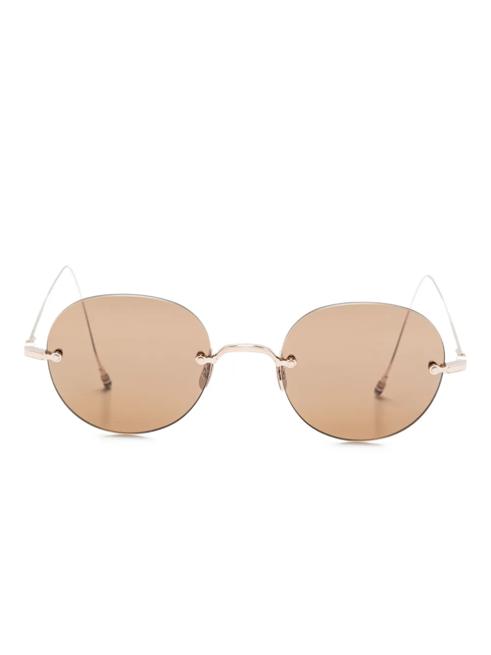 

Солнцезащитные очки в круглой оправе из металла 938A Thom Browne Eyewear, золотой