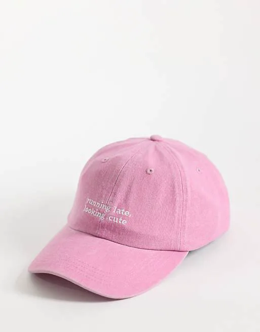 

Розовая кепка с надписью ASOS DESIGN Running Late