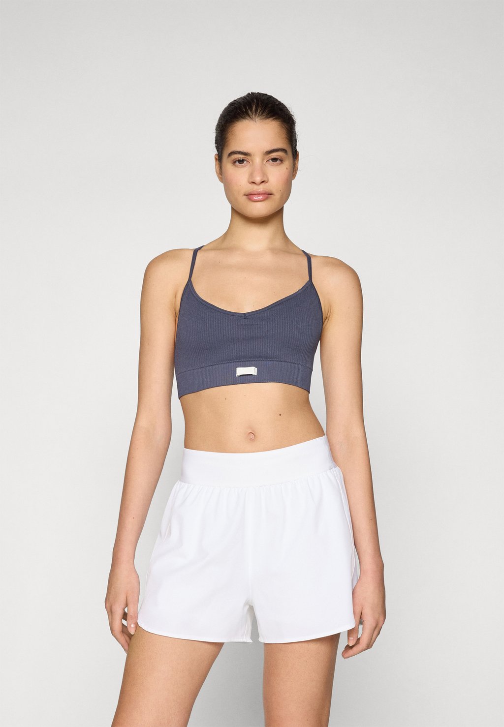 

Спортивный бюстгальтер с легкой поддержкой STUDIO SEAMLESS STRAP BRA Björn Borg, сине-серый