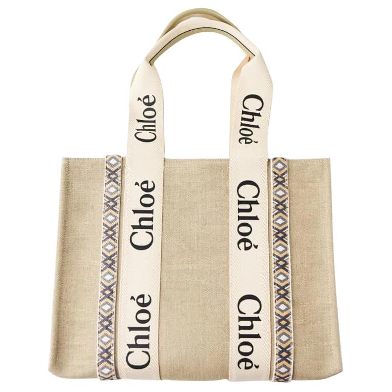 

Chloé Сумка Chloe Woody из коровьей кожи средняя женская бежевая