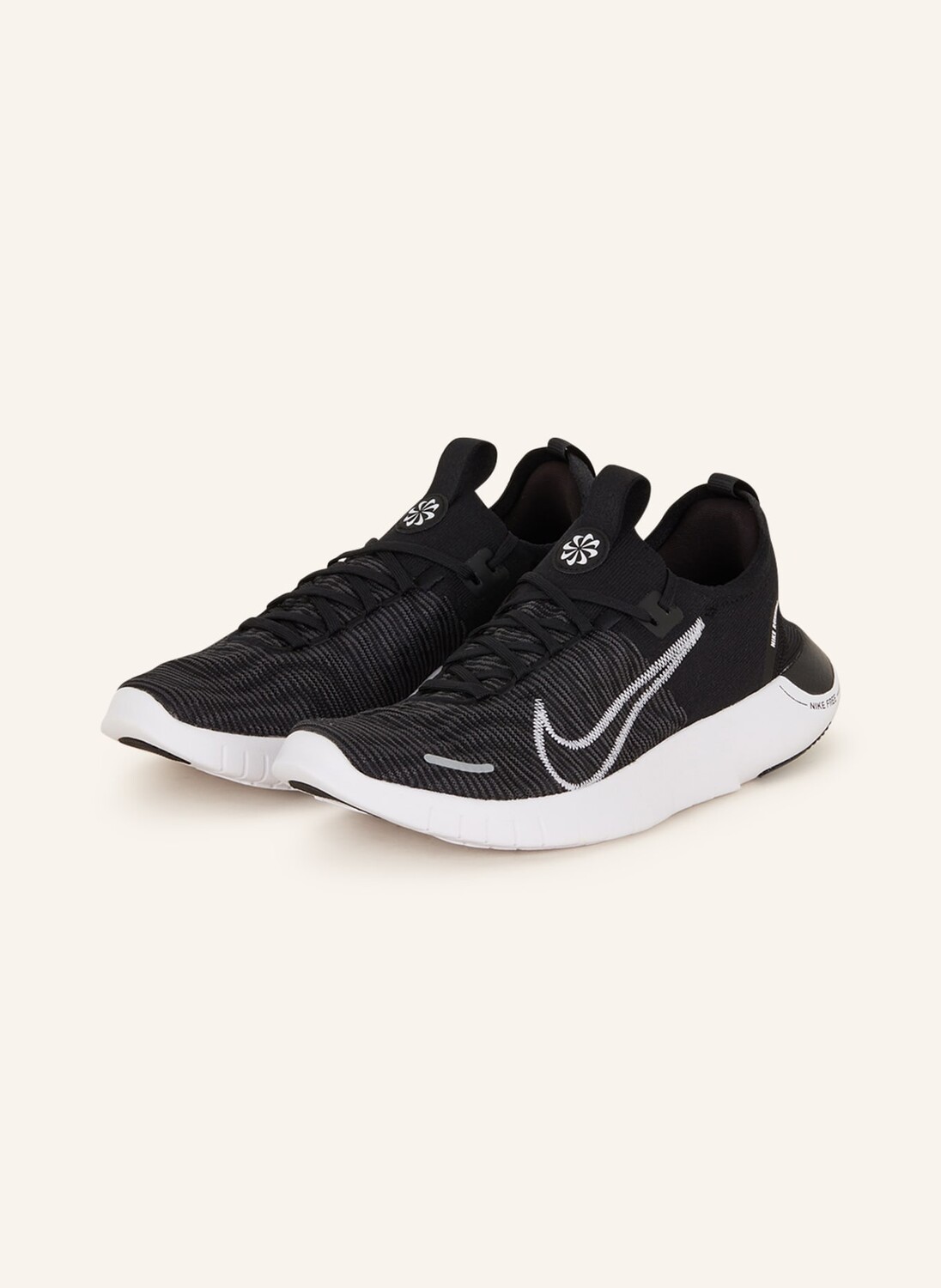 

Кроссовки free rn nn Nike, черный/белый