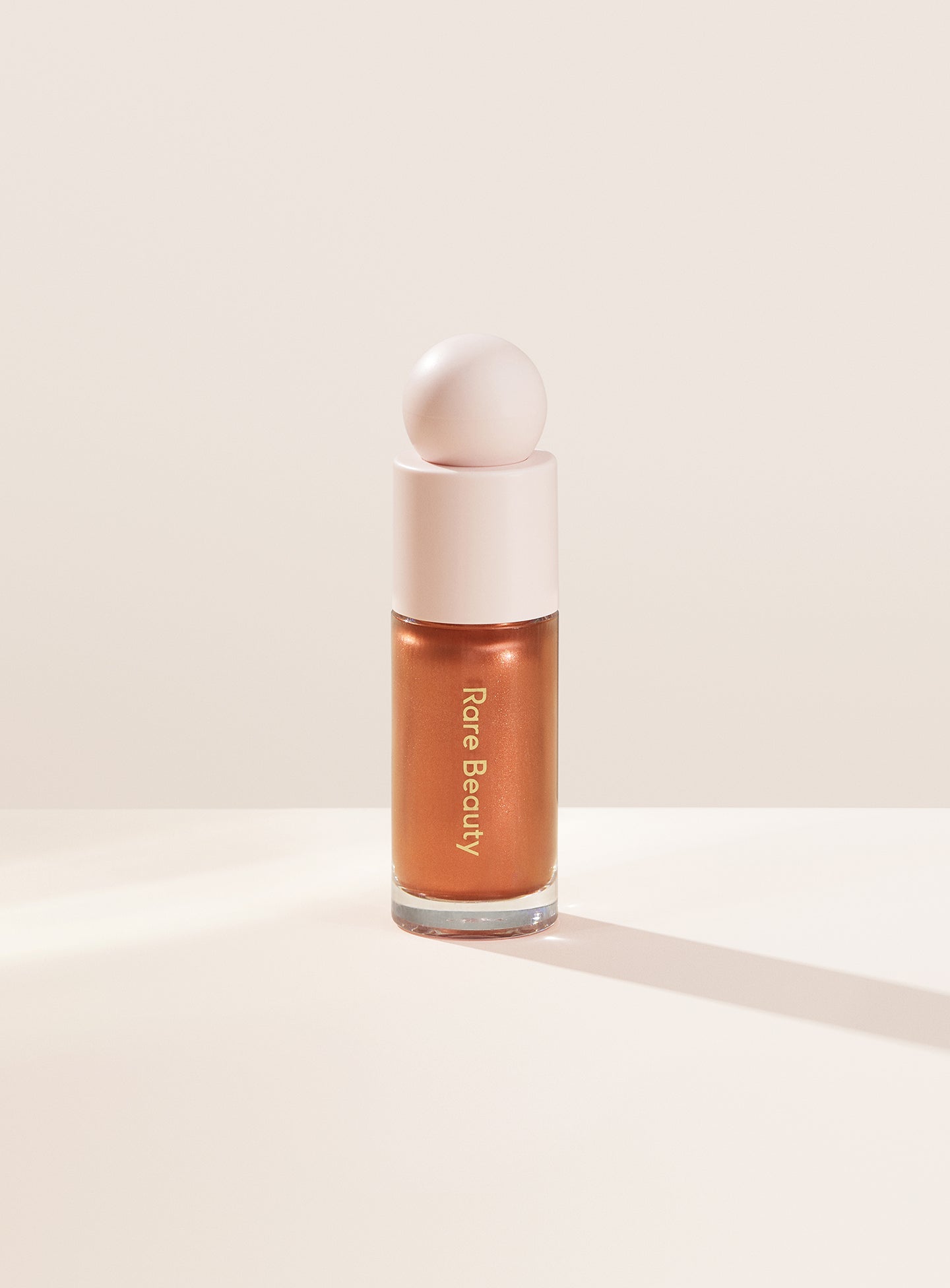 

Жидкий люминайзер Positive Light Rare Beauty, цвет reveal/warm copper, 15 мл