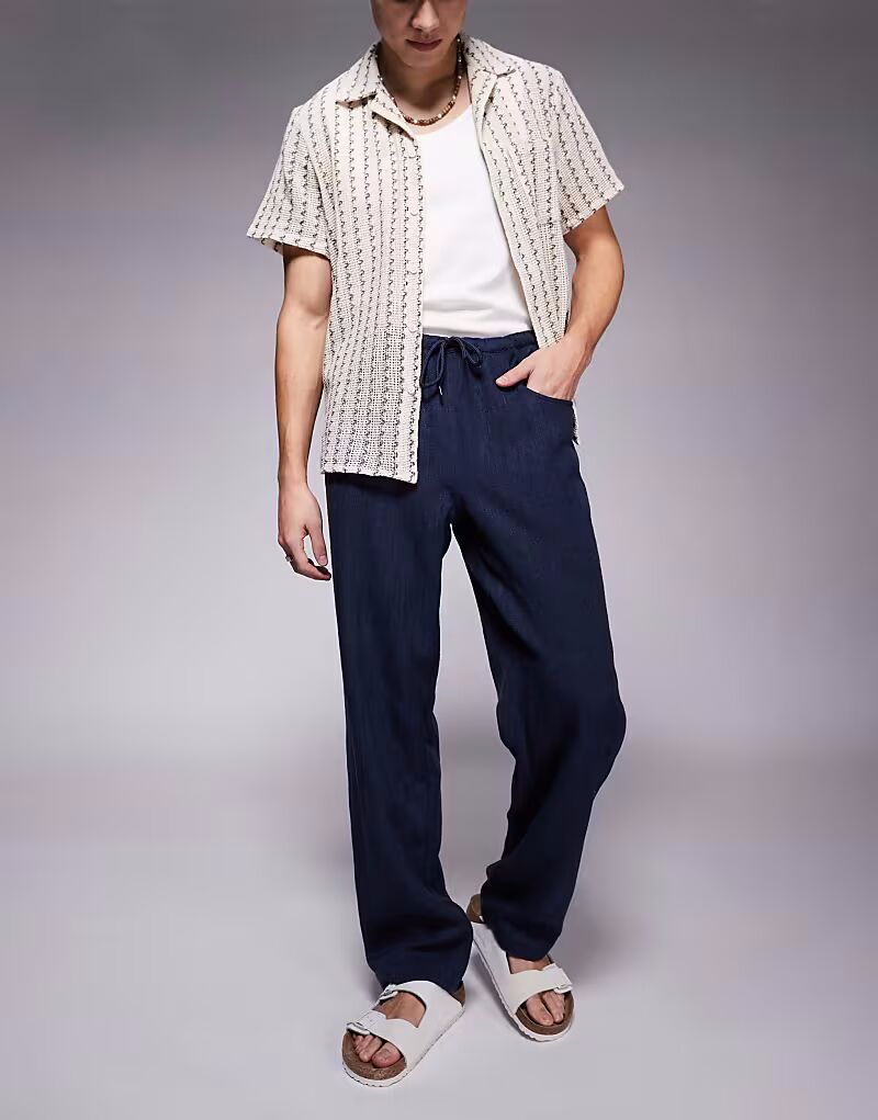 

Брюки-мешковатые с завязками на шнурке от ASOS DESIGN темно-синего цвета