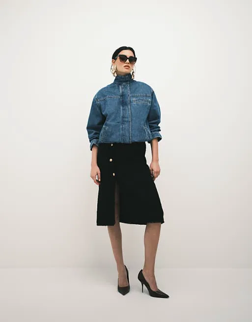 

Черная юбка-букле с низкой посадкой и нестандартной длиной ASOS DESIGN