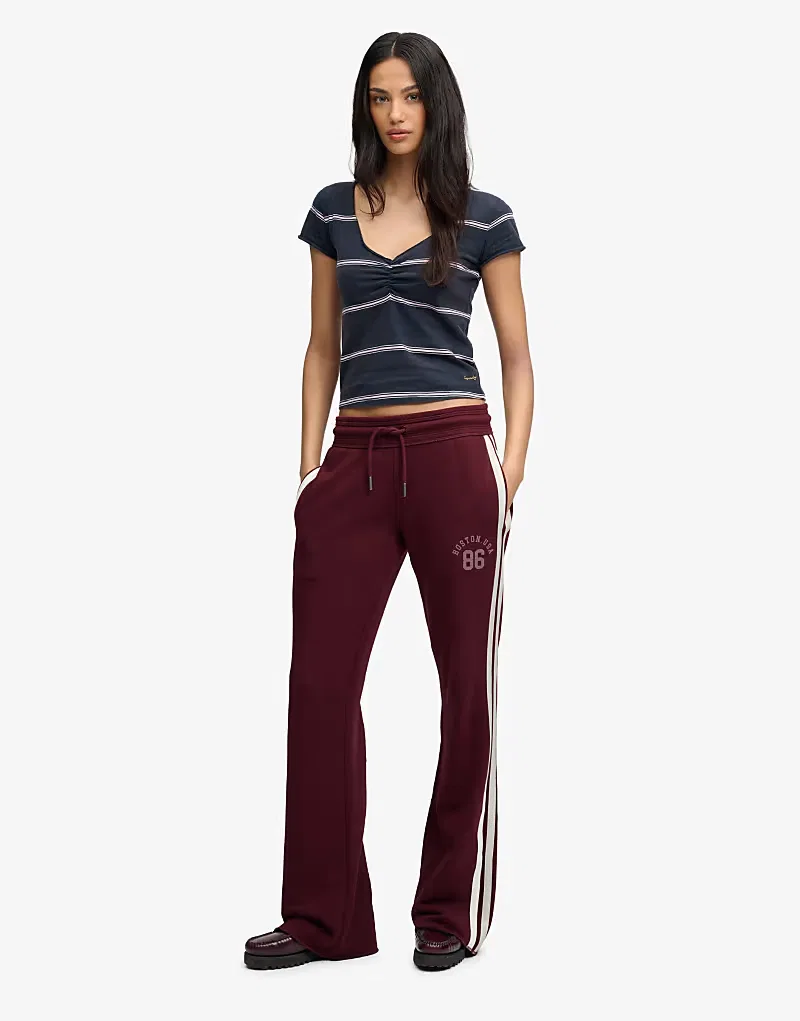 Спортивные брюки Superdry Athletic Essentials в полоску, расклешенные, ярко-красный