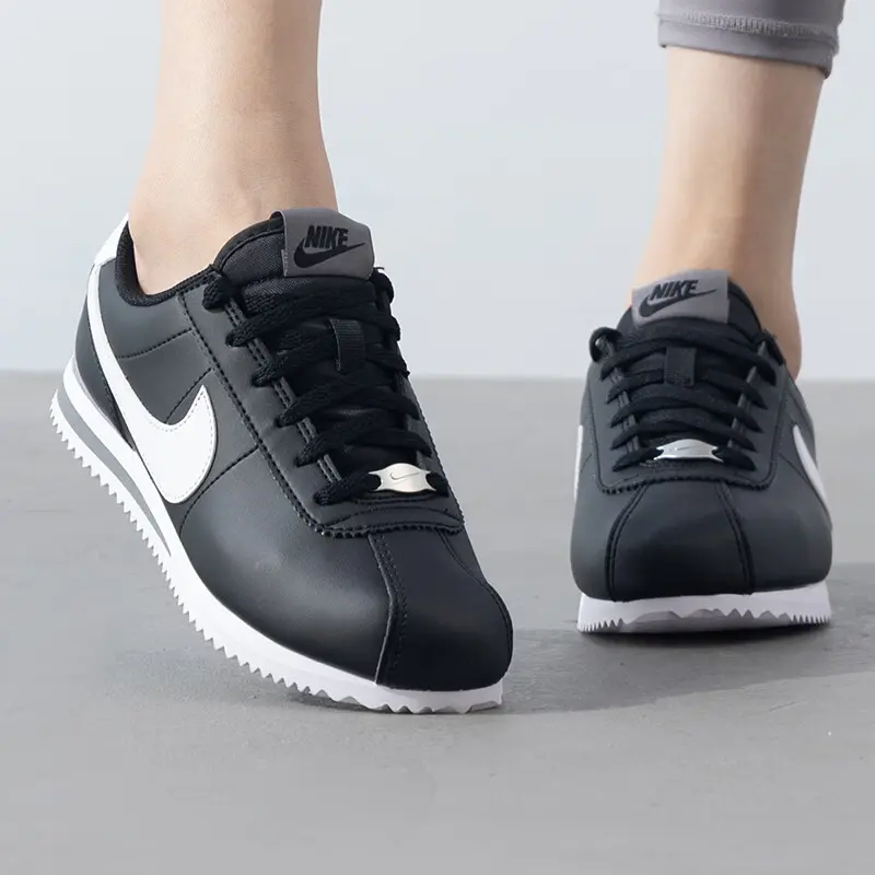 Детские кроссовки Cortez Slip с низким верхом для повседневной носки Nike, черный/белый — фото 2