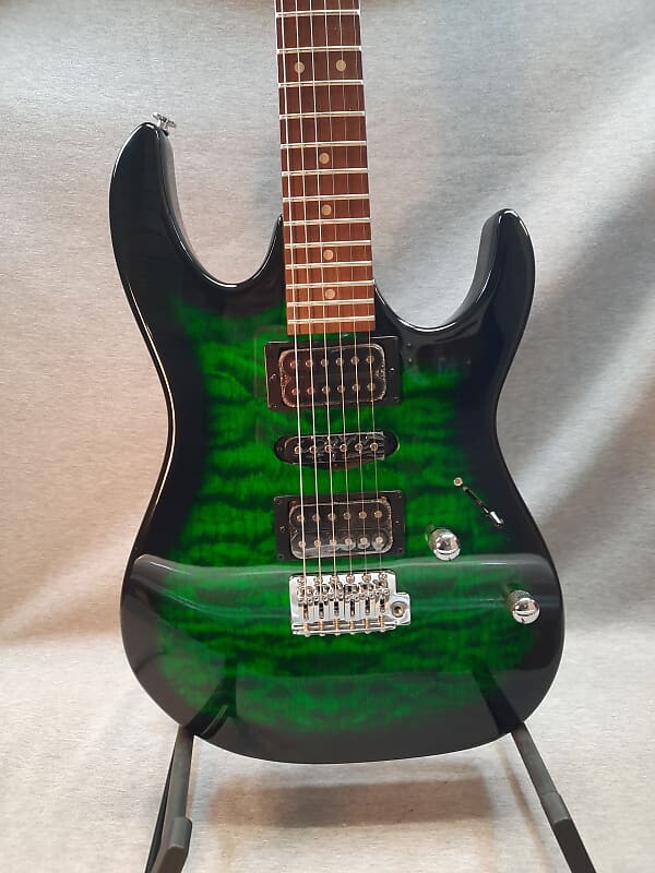 

Ibanez Gio GRX70QA Изумрудный взрыв