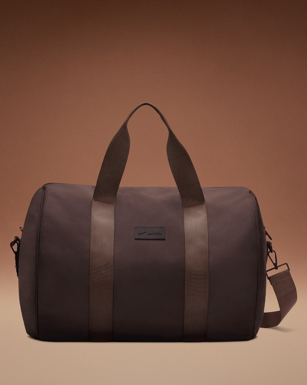 

Спортивная сумка NikeSKIMS Puffer Gym, темно-коричневый