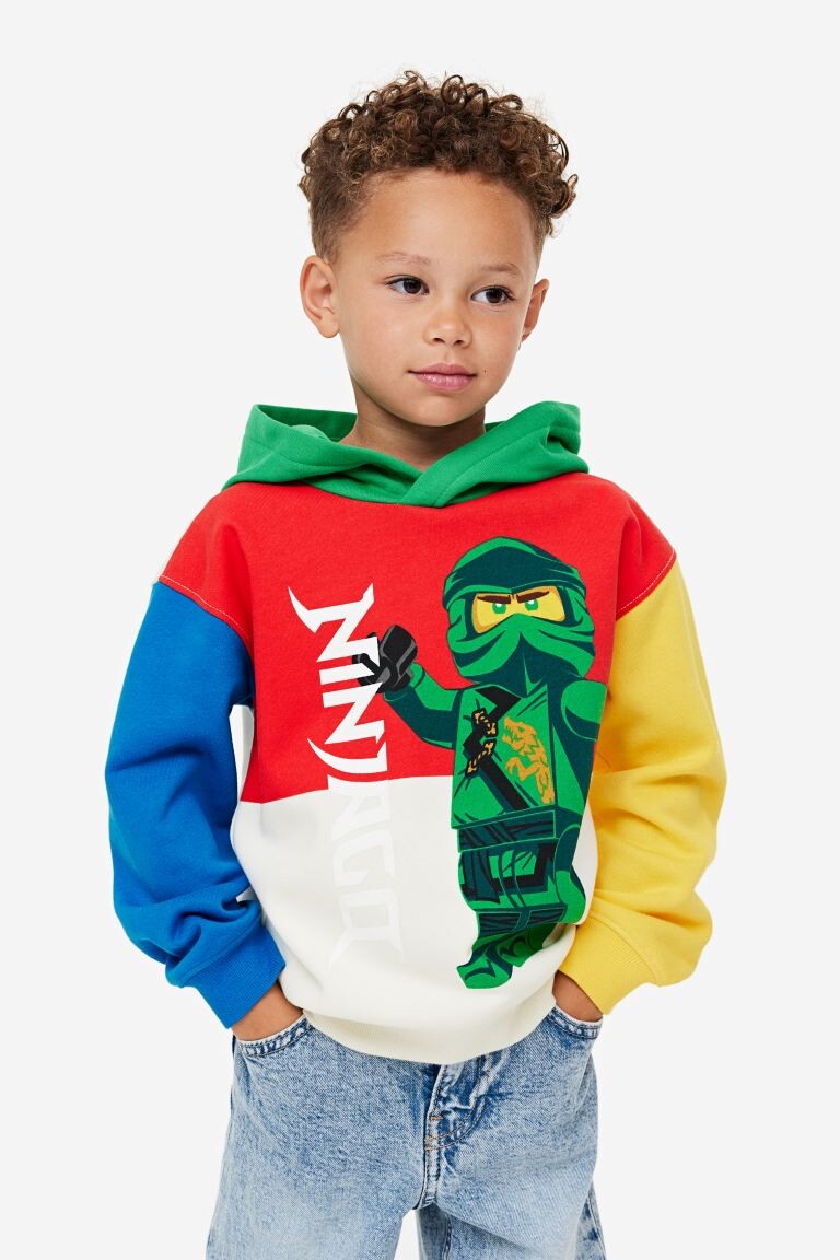 

Топ с капюшоном и принтом H&M
