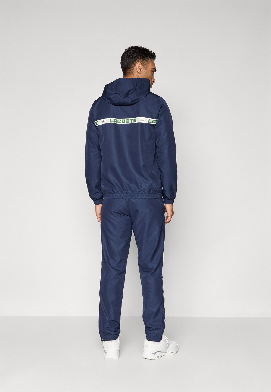 Спортивный костюм Lacoste Sport TENNIS TRACKSUIT HOODED SET, Navy Blue/Dark Blue — фото 3