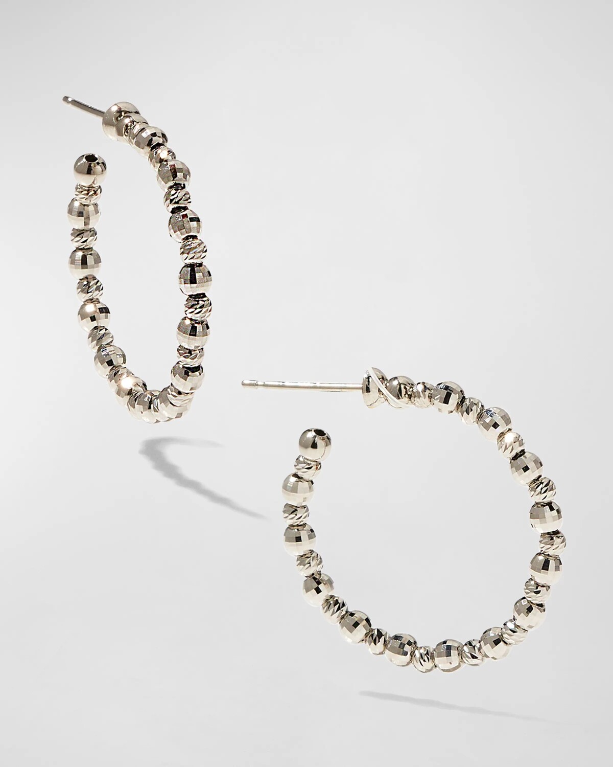 

Маленькие платиновые серьги-кольца Platinum Born