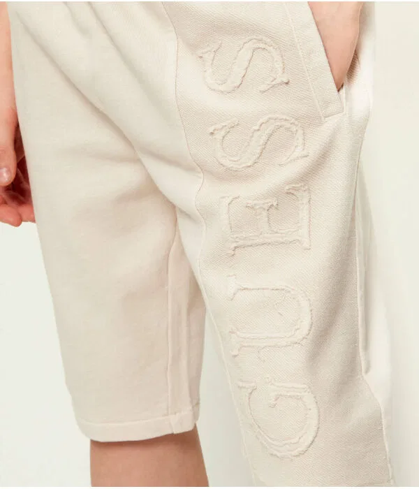 Детские шорты хлопковые Guess, бежевый — фото 4