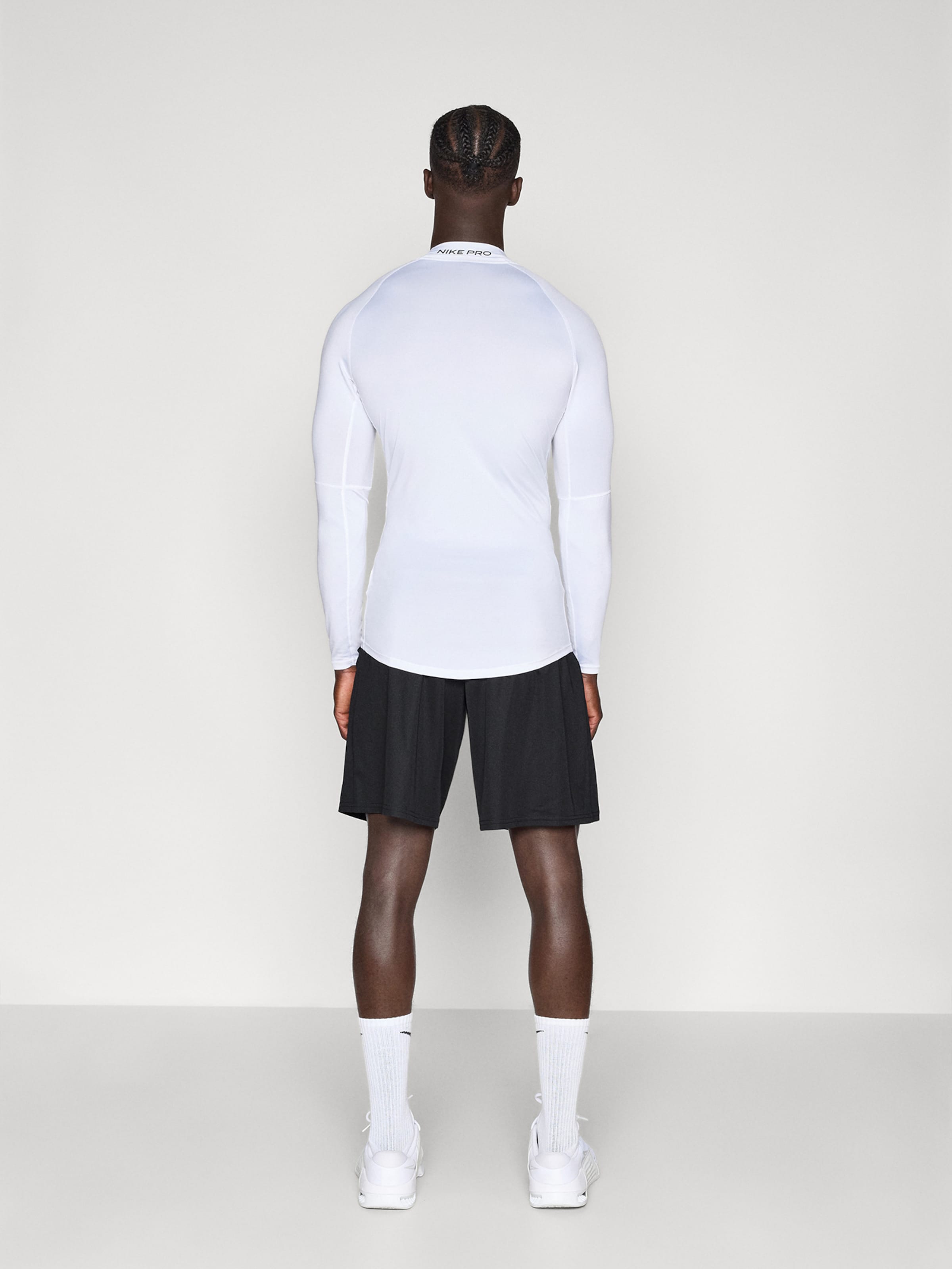 NIKE Шорты для тренировок 'FLEX' свободного кроя в черном цвете — фото 3