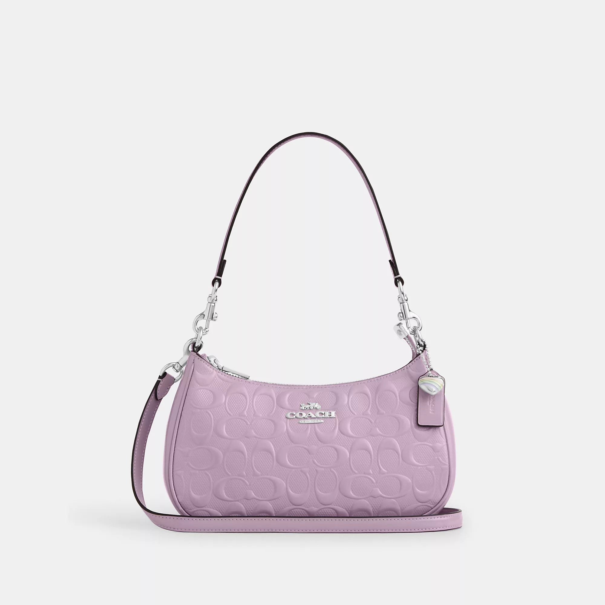 

Сумка Coach Outlet Teri через плечо из фирменной кожи с подвеской в ​​виде сердца, серебристый/светло-фиолетовый