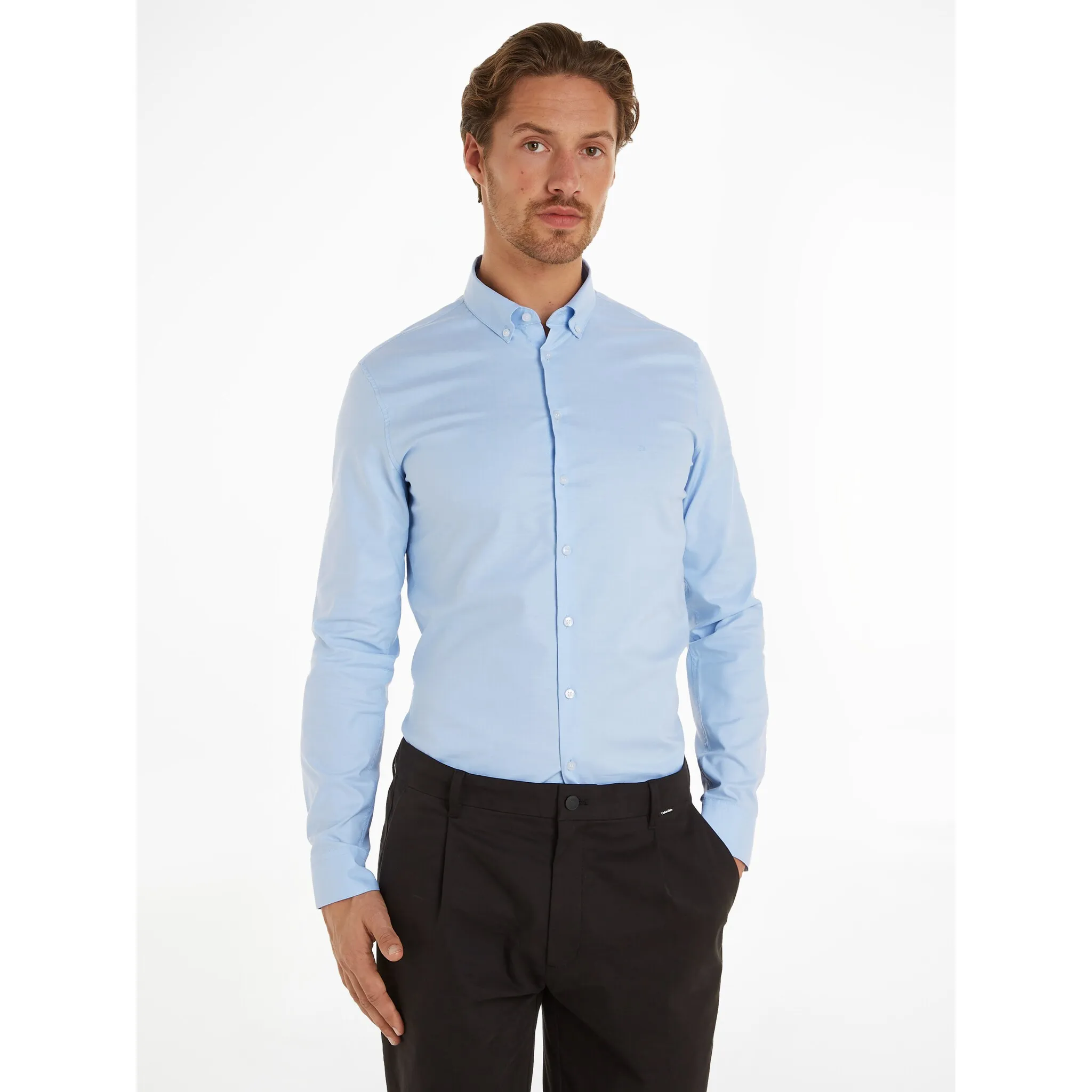

Рубашка Calvin Klein с длинными рукавами "OXFORD SOLID SLIM SHIRT" и тисненым логотипом, цвет Vista Blue