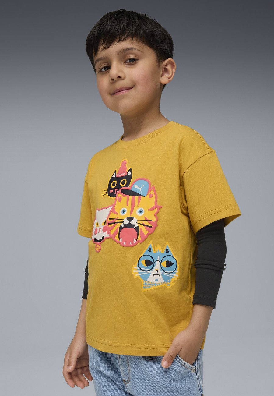 

Футболка Puma MOODY CAT GRAPHIC, Archive Gold/Yellow