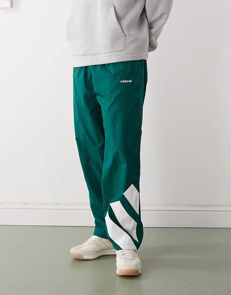 Спортивные брюки Adidas Originals Adicolor с контрастными вставками, зелено-белого цвета