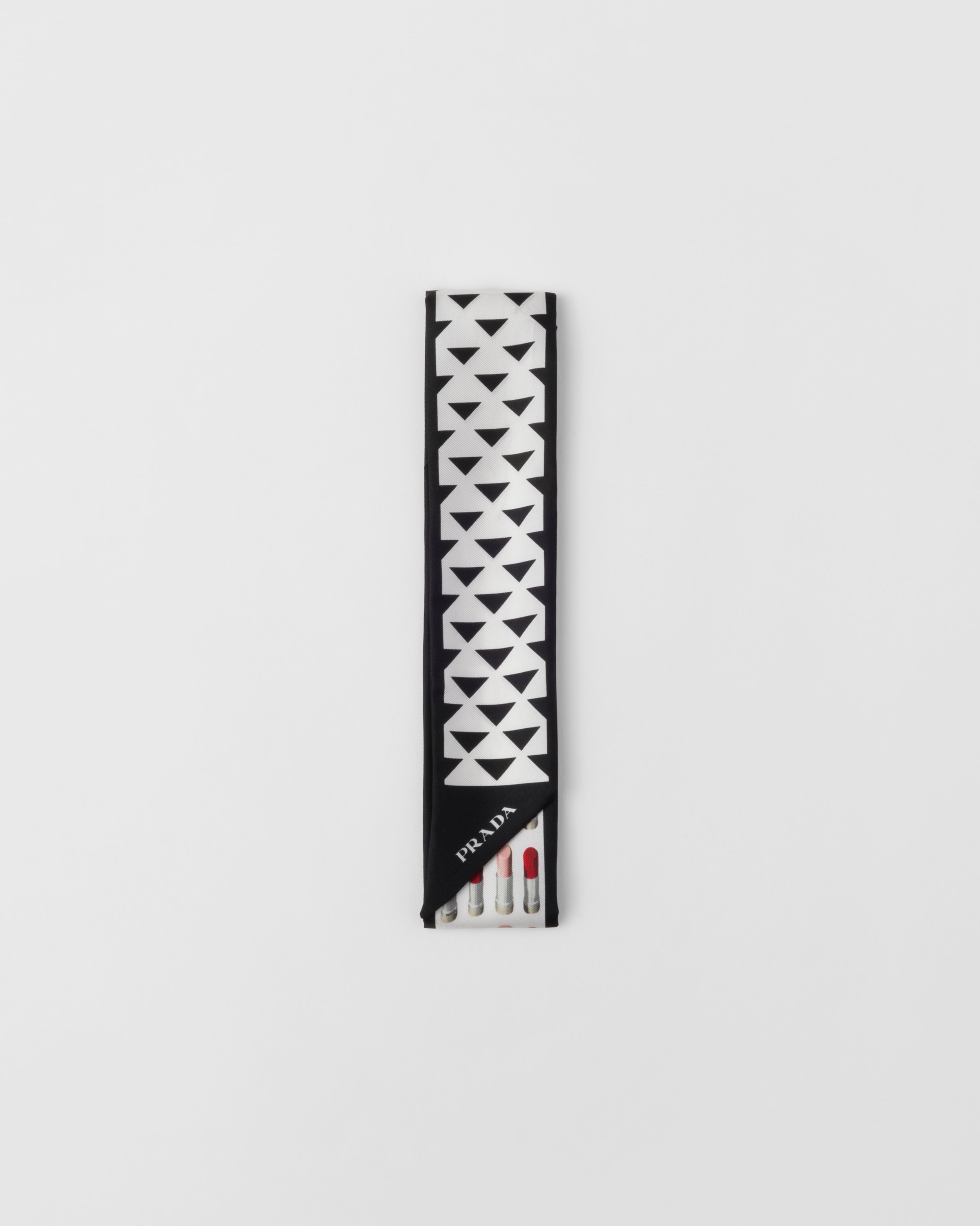 

Принтованный узкий шарф из шелкового твила Prada, черный