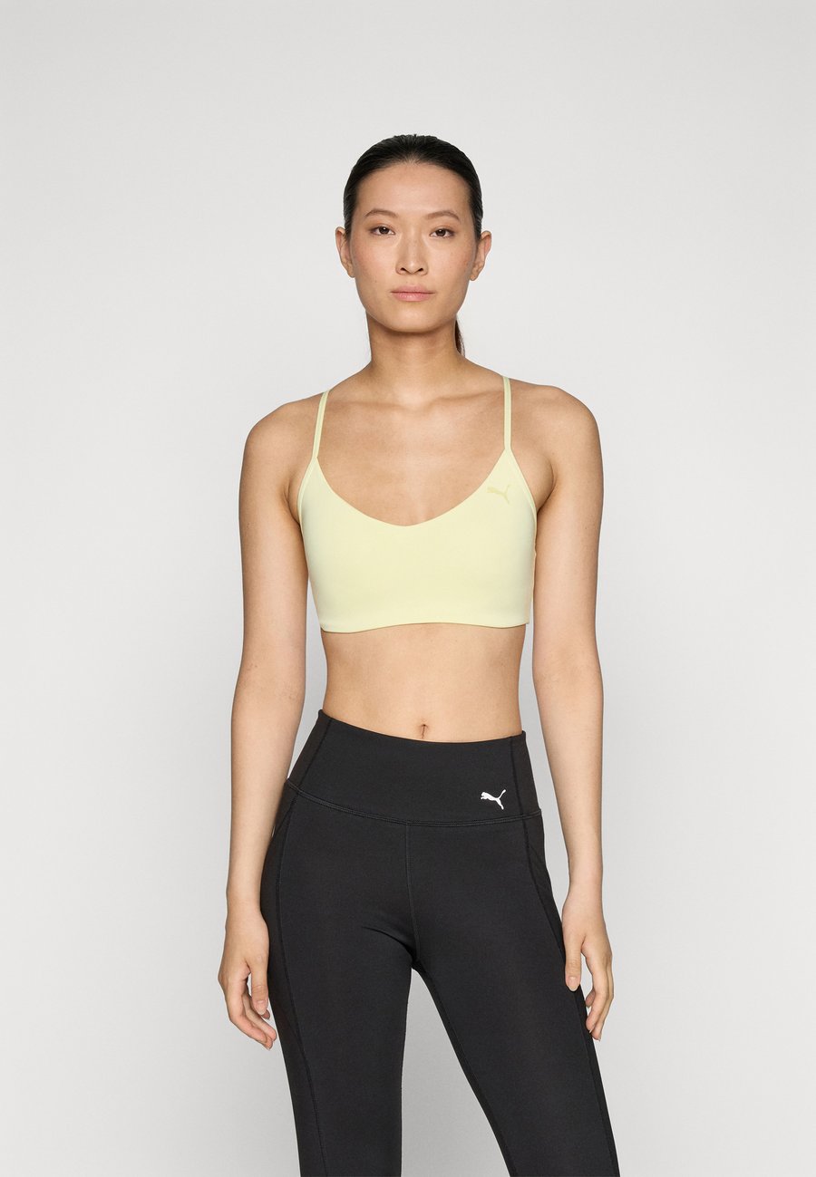 

Бюстгальтер Puma MOVE BRA, Gold Moon/Yellow