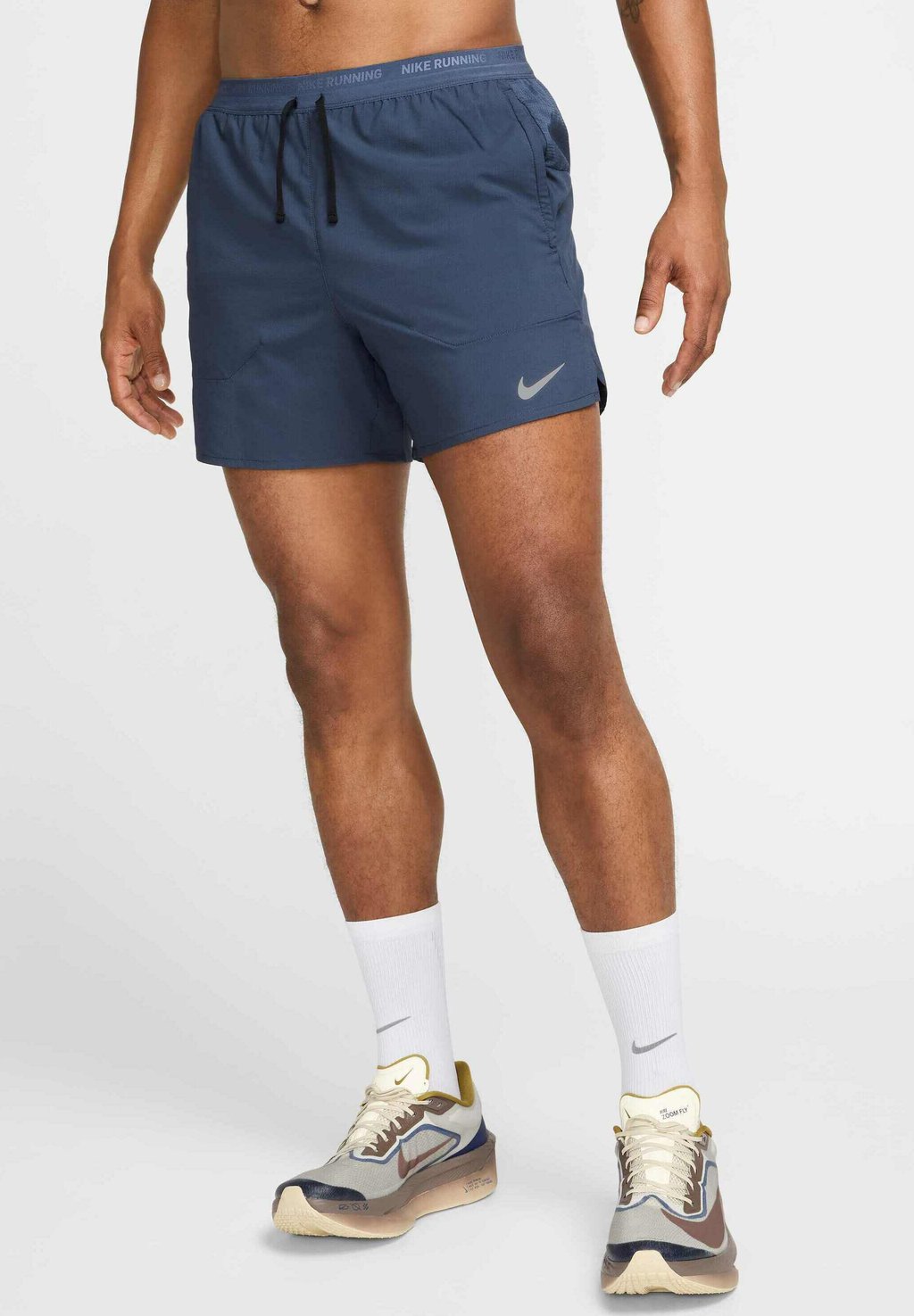 

Спортивные шорты STRIDE Nike Performance, синий