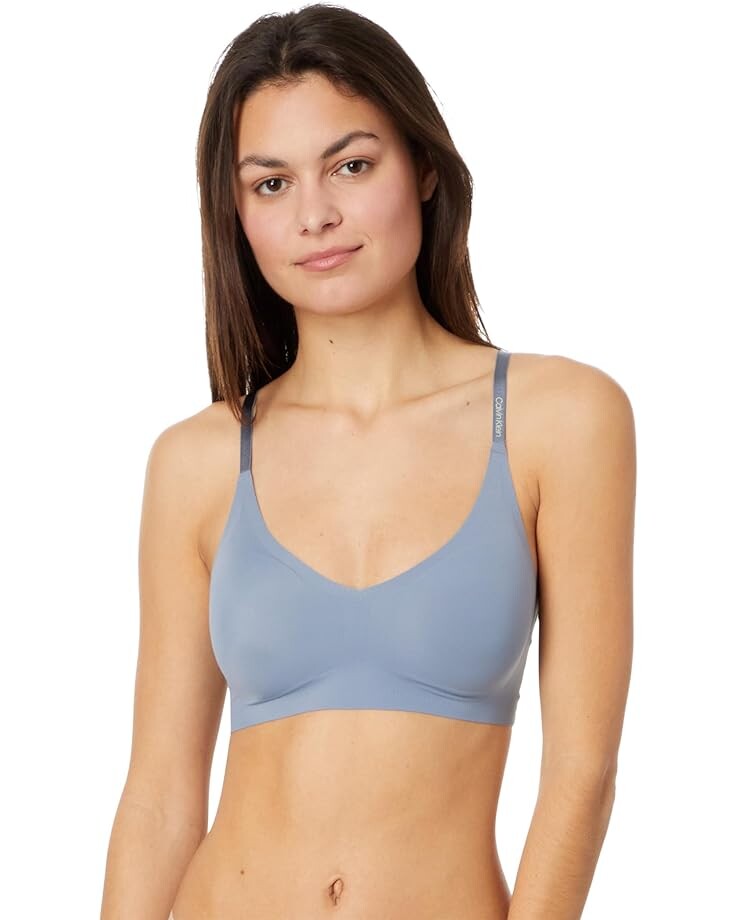 

Бюстгальтер Calvin Klein Underwear Invisibles Comfort Lightly Lined Seamless Wireless Trianglelette, цвет Flint Stone