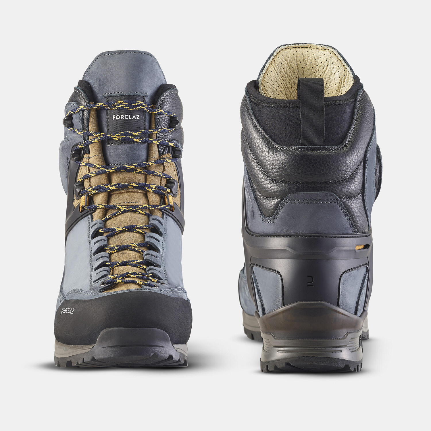 Ботинки кожаные треккинговые мужские Forclaz Vibram MT500 Ultra, синий/карамельный — фото 4