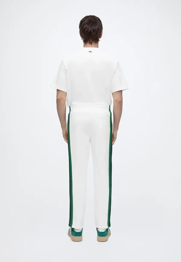 Спортивные брюки Lacoste, однотонные, хлопок — фото 3