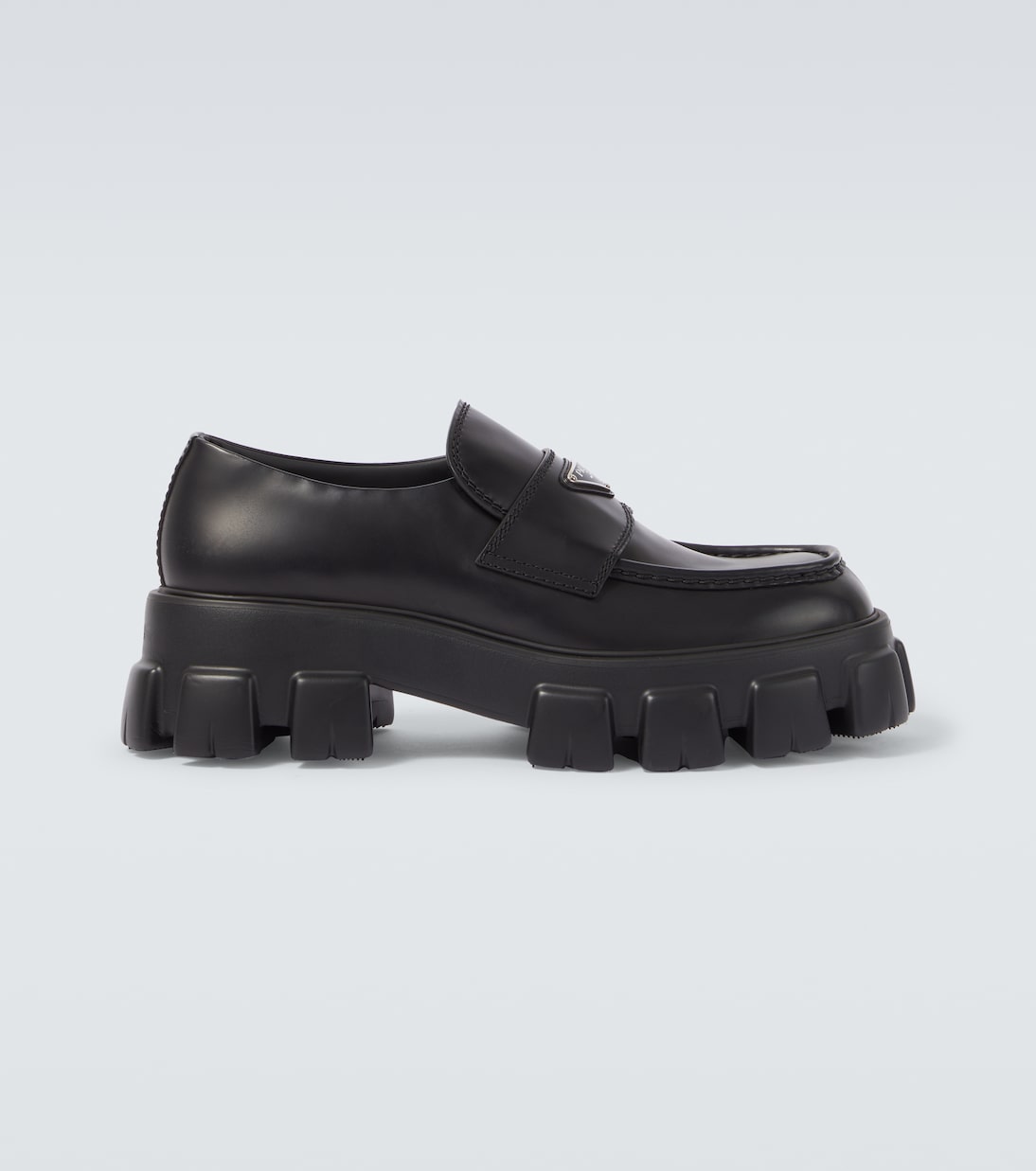

Кожаные лоферы на платформе с логотипом Prada, черный