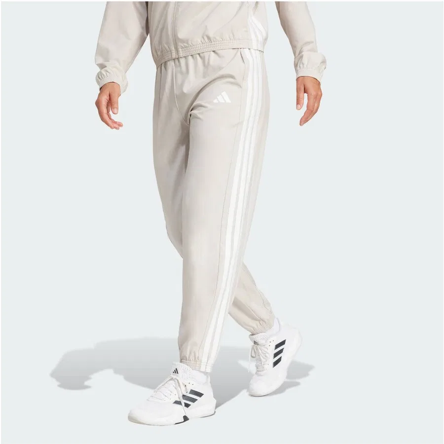 Спортивные штаны с эластичным поясом и зауженными брючинами Train Essentials 3-Stripes Woven Pants adidas, Бежево-белый