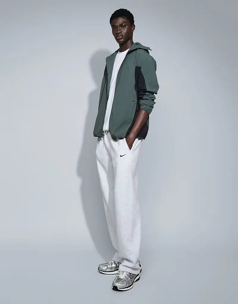 Спортивные брюки Nike Solo из флиса с завязками, прямого кроя, светло-серые