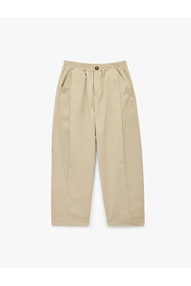Детские брюки для девочек широкие с защипами Pleated cotton oversize gabardine fabric trousers Koton, Beige — фото 3