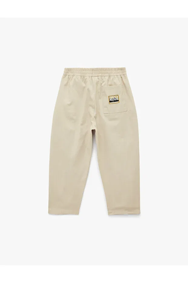 Детские брюки для девочек свободного кроя Elastic waist oversize balloon cut trousers Koton, Beige — фото 2