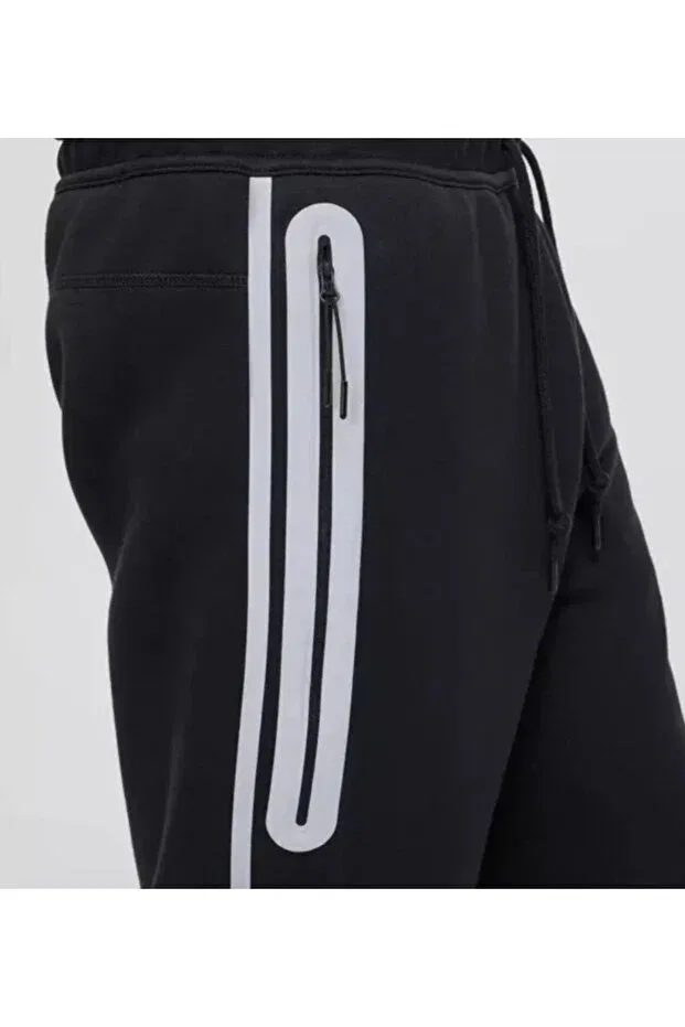 Детские спортивные штаны для девочек с принтом Tech Fleece TF+ Reflective Jogger Kids Sweatpants FZ5434 Nike, Black — фото 2