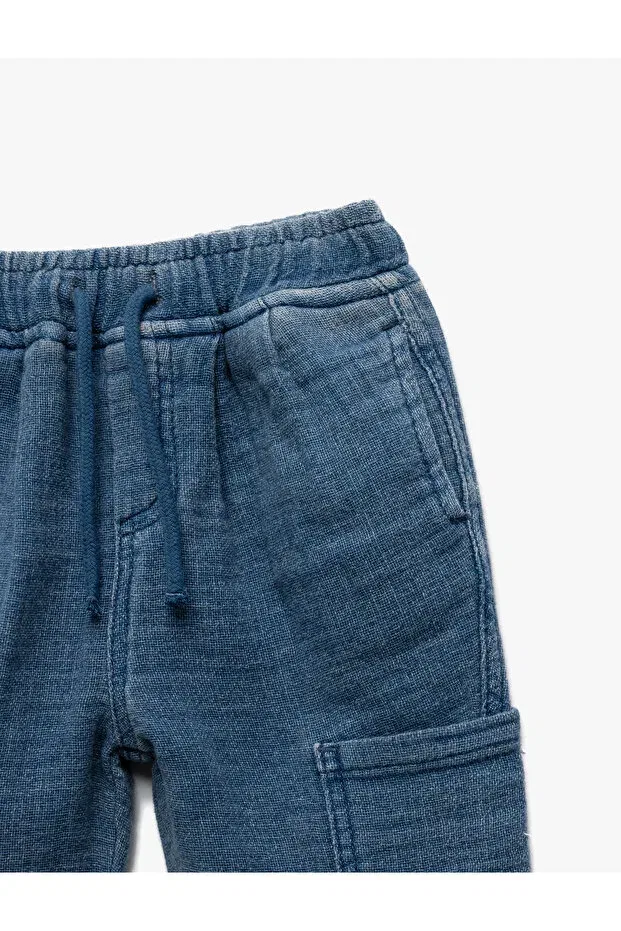 Детские штаны для девочек хлопковые Oversize jogger trousers with cotton pocket detail Koton, Indigo — фото 3