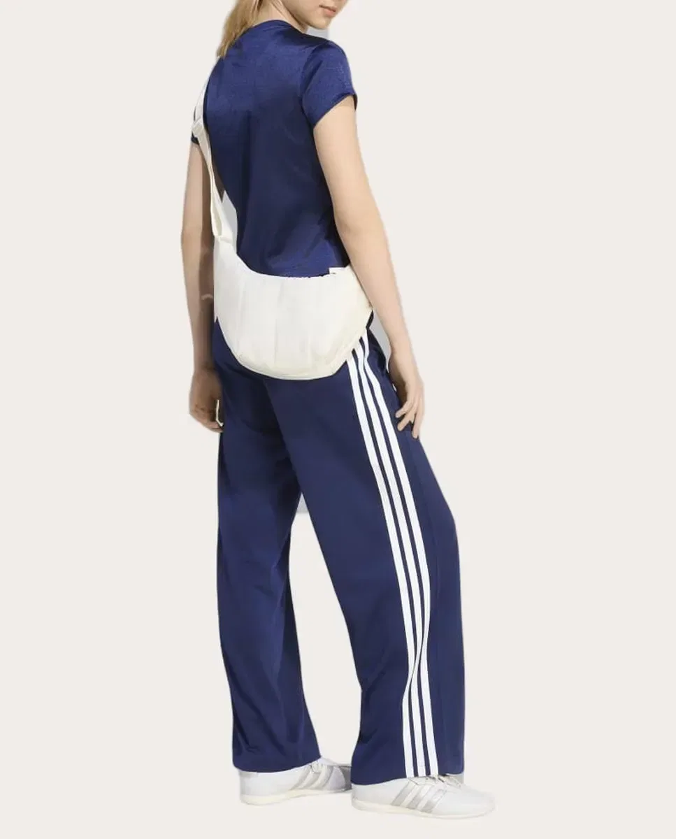 Женские широкие спортивные брюки из переработанного полиэстера adidas, Синий — фото 3