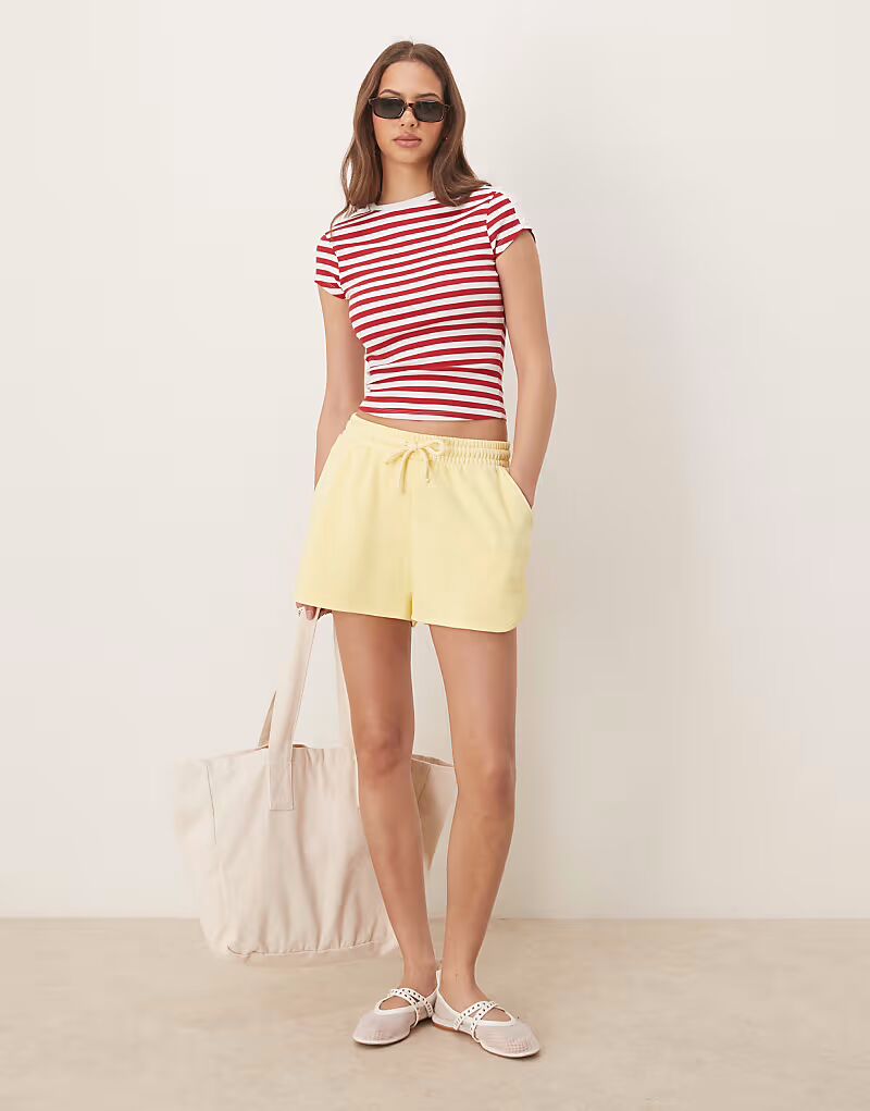 

Спортивные шорты ASOS DESIGN цвета стираный лимон