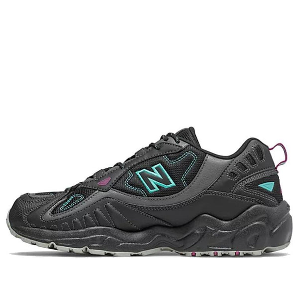 

Кроссовки 703 black New Balance, черный