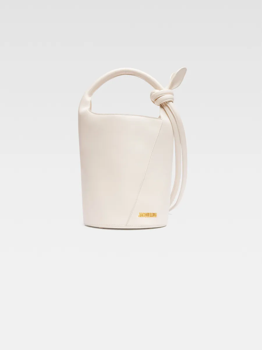 

Миниатюрная сумка-ведро с узлом Ле Турни Jacquemus, слоновая кость