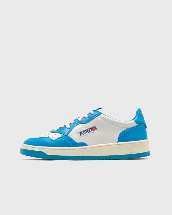 

Кроссовки Autry Action Shoes Wmns Medalist Low, цвет leat/leat wht/cobalt