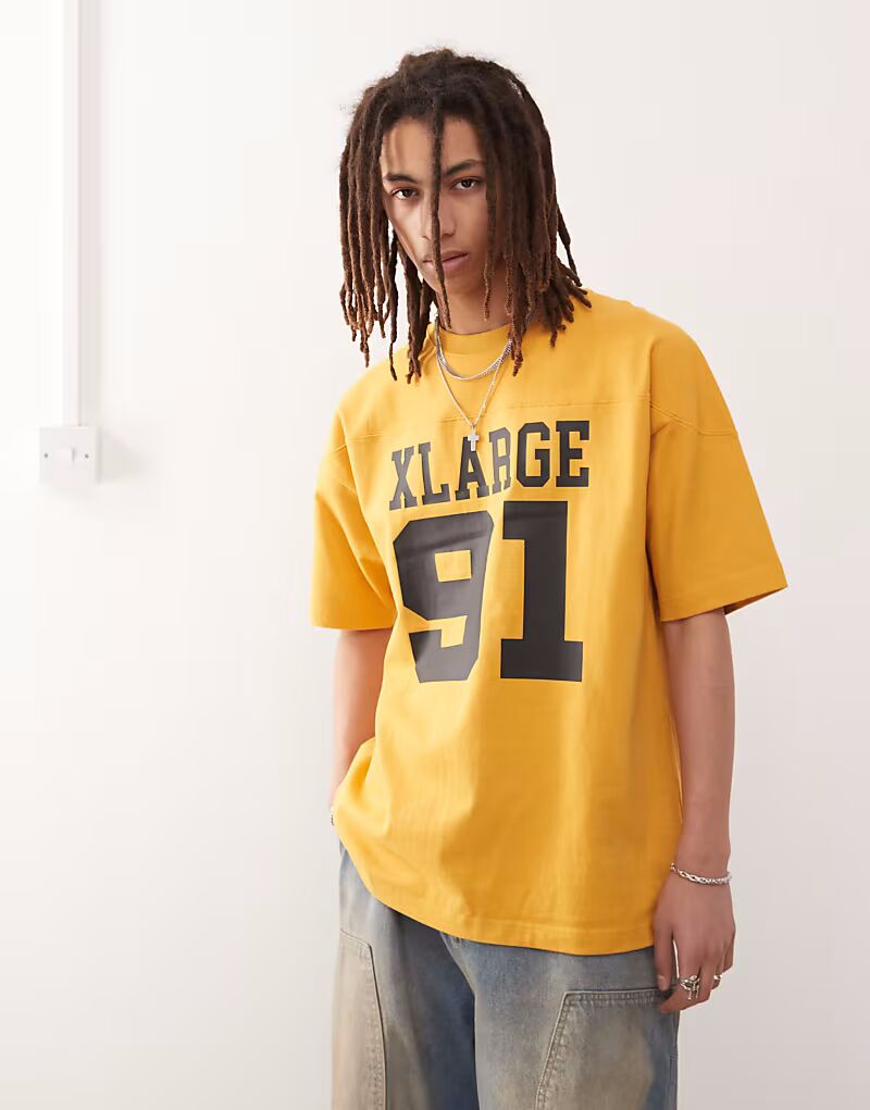 

Футболка XLARGE с крупным логотипом и принтом номера 91 желтого цвета