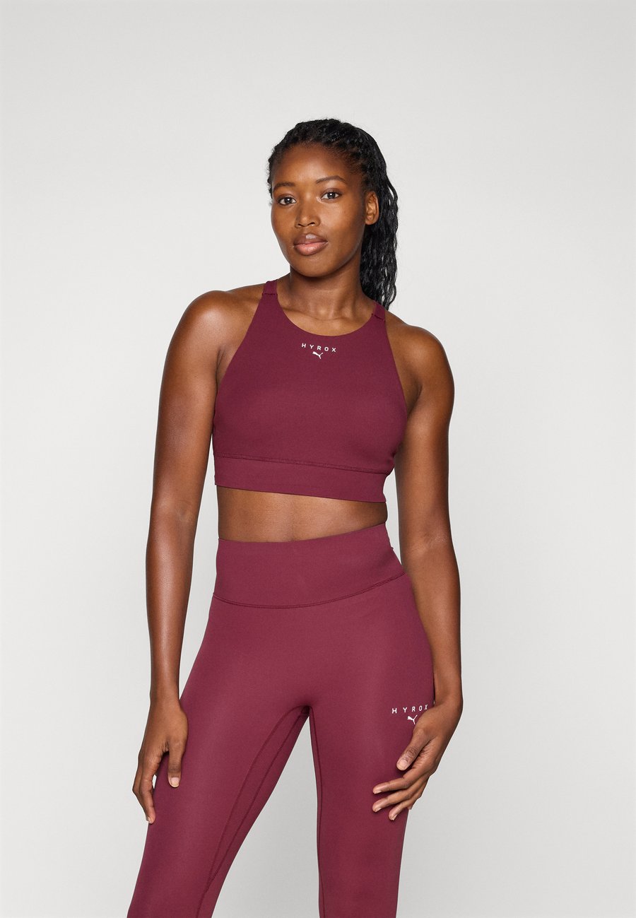 

Бюстгальтер Puma HYROX SHAPELUXE HIGH NECK BRA, Ruby Shimmer/Bordeaux
