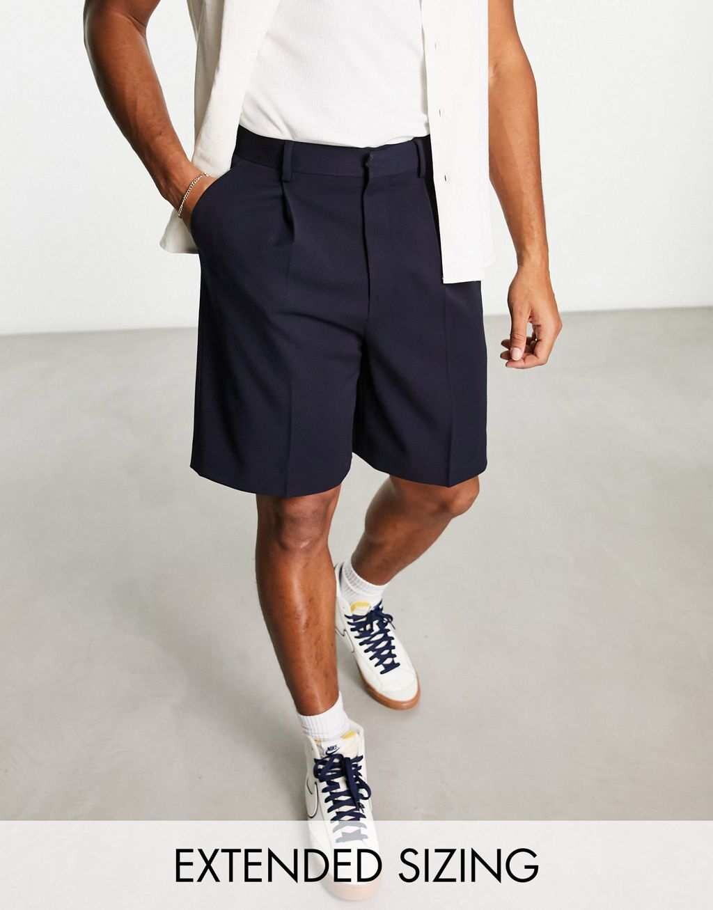 

Темно-синие широкие шорты ASOS DESIGN
