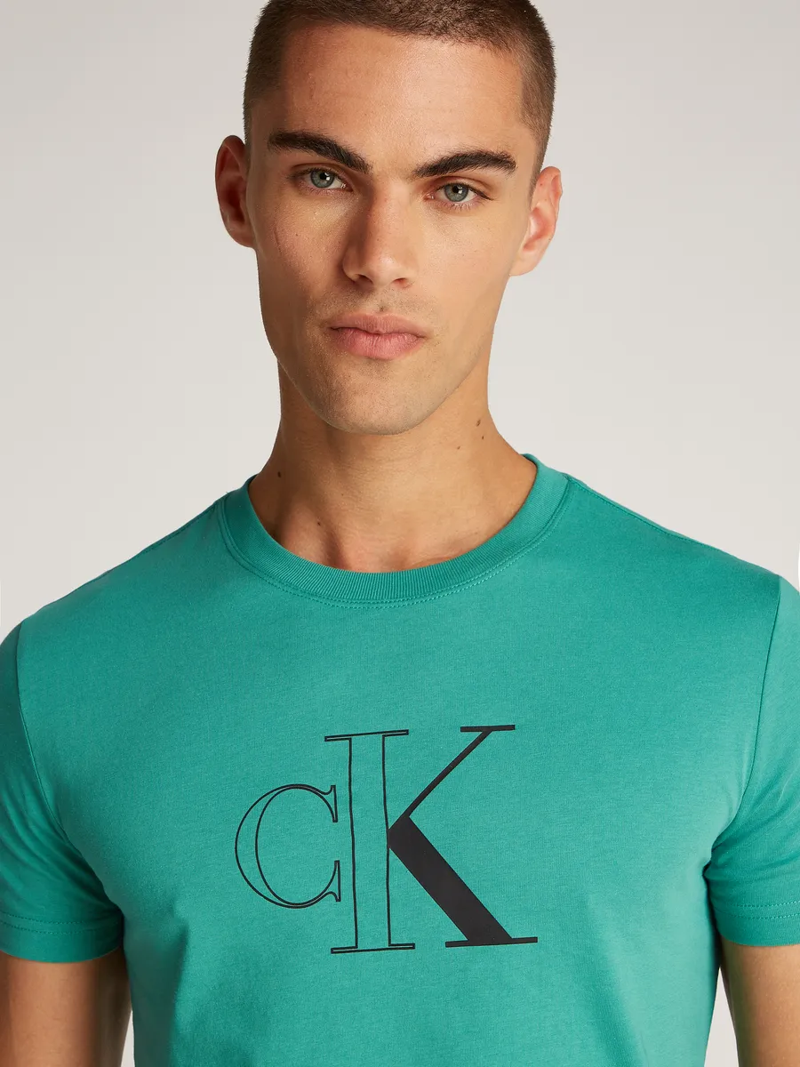 

Футболка Calvin Klein Jeans "OUTLINE MONOLOGO TEE" с тисненым логотипом, цвет Bahama Green