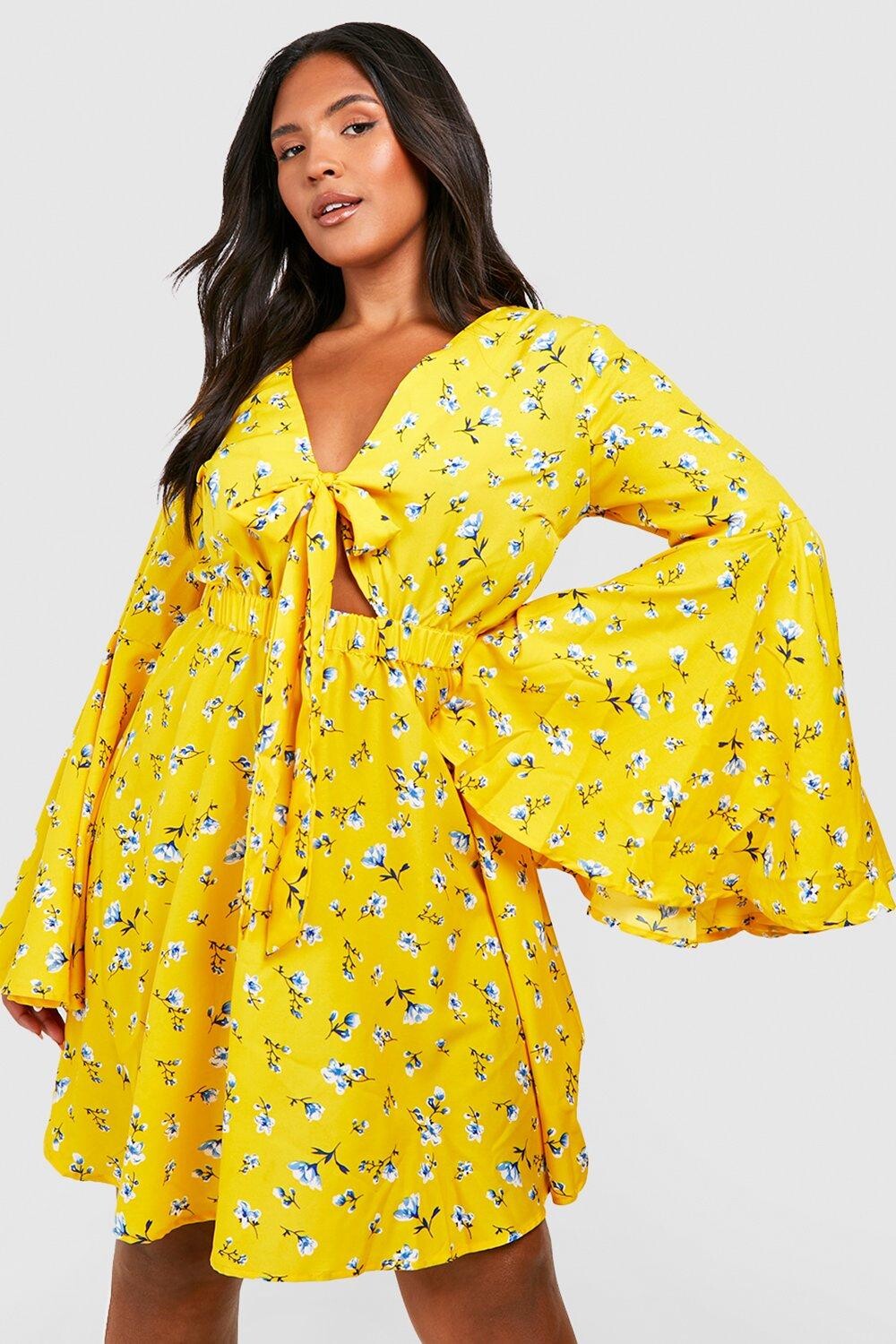 

Расклешенное платье с плиссированной юбкой и цветочным узлом спереди boohoo, желтый