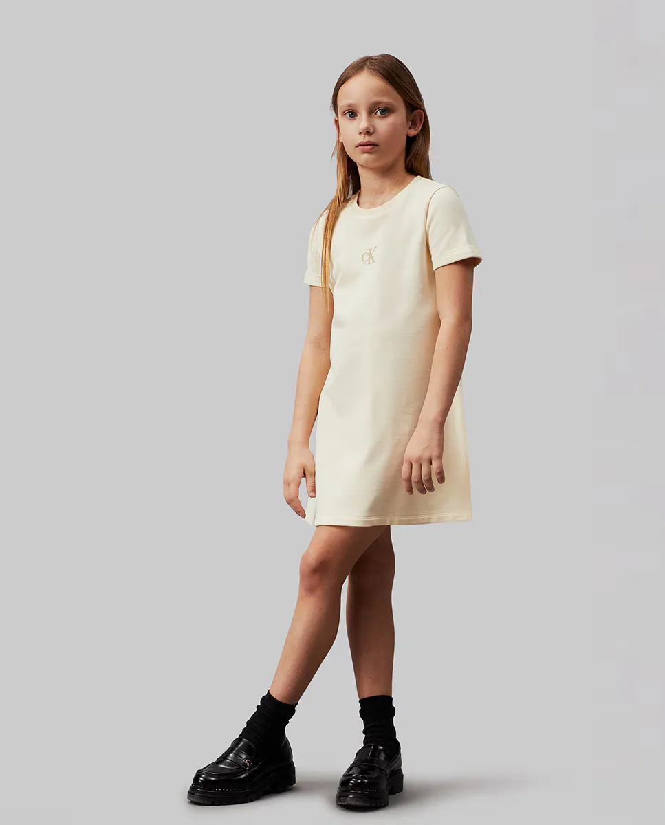 

Девушка платье Calvin Klein, цвет Crema